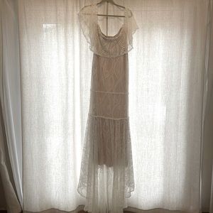 White bohemian style lace dress, off the shoulder with short train